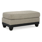Ottoman imbottito grigio con finiture in legno nero opaco, 1 posto